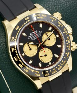 Alternative view of Rolex Cosmograph Daytona, in 18ct Yellow Gold, Black Ceramic Bezel, Black Index Dial with Champagne Sub-Dials, on Rolex Oysterflex Strap with 18ct Yellow Gold Rolex Deployant, Ref. 116518LN, Circa: 2023, with Box, Books, Rolex Warranty Card & Balance of 5 Year Rolex Factory Warranty
