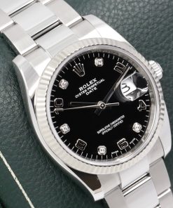 Alternative view of Rolex Oyster Perpetual Date, Stainless Steel, 18ct White Gold Fluted Bezel, Factory Set Diamond Dial, on Stainless Steel Rolex Oyster Bracelet, Ref. 115234, Circa: 2018, with Box, Books, Swing Tag, and Rolex Warranty Card