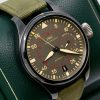 IWC Big Pilot's Top Gun Miramar with Date, Black Ceramic case, Grise Dial with luminescence, Green textile strap with an IWC steel Tang Buckle, Box, Books and IWC Warranty Card, Circa: 2015
