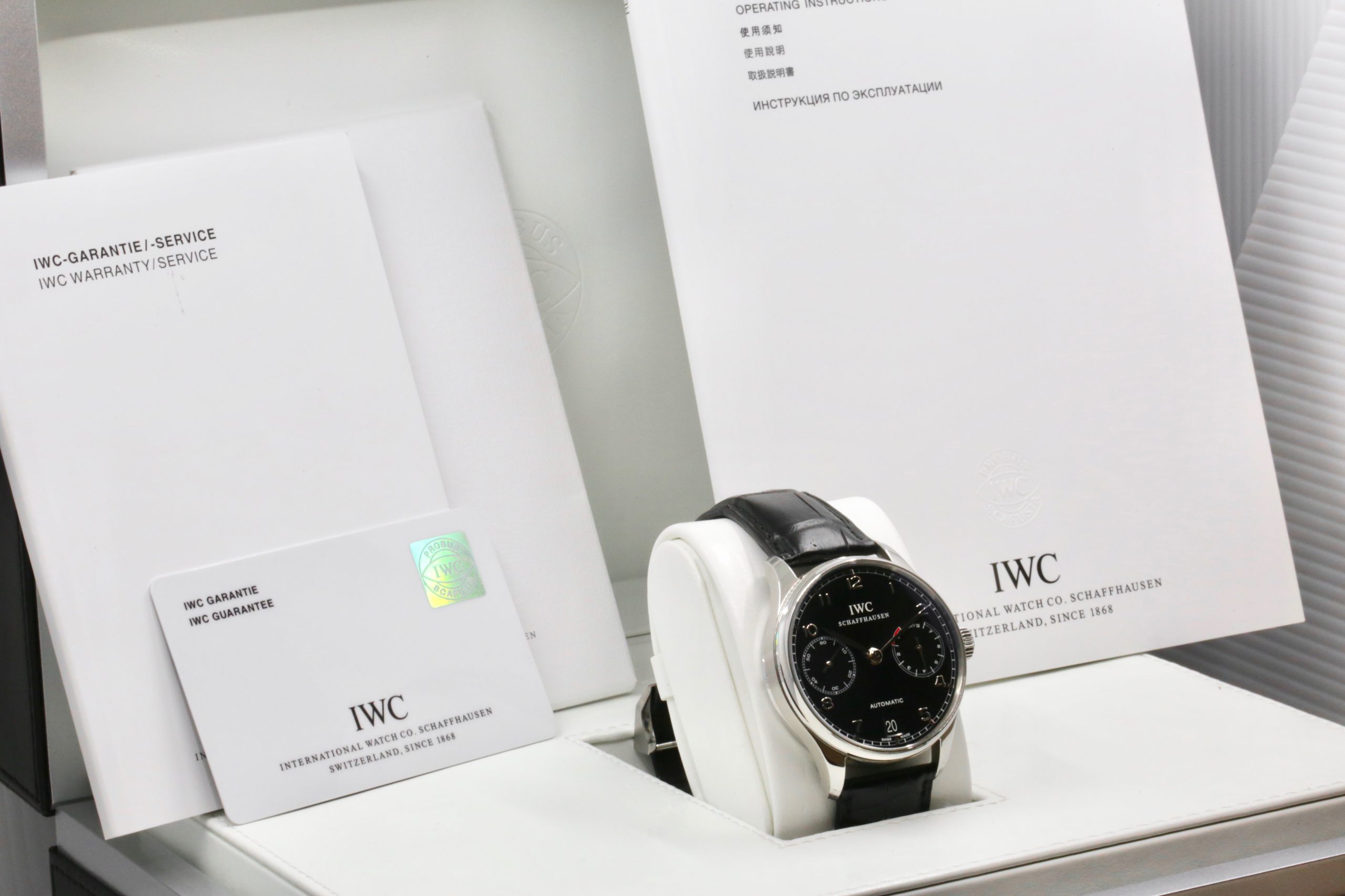 IWC Schaffhausen Portuguese Automatic 7 Day, Stainless Steel, Black Arab Dial, on Black IWC Alligator Strap with Stainless Steel IWC Deployant, Ref. IW500109, Circa: 2011, Complete with Box, Books & IWC Warranty Card - Image 6
