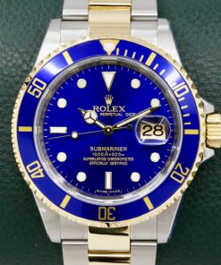 Rolex Submariner Date "Bluesy", in Stainless Steel & 18ct Yellow Gold, Blue Index Dial, on Stainless Steel & 18ct Yellow Gold Rolex Oyster Bracelet, Ref. 16613, Circa: 2010, with Box, Rolex Warranty Card, Rolex Service Card & Balance of 2 Year Rolex Service Warranty
