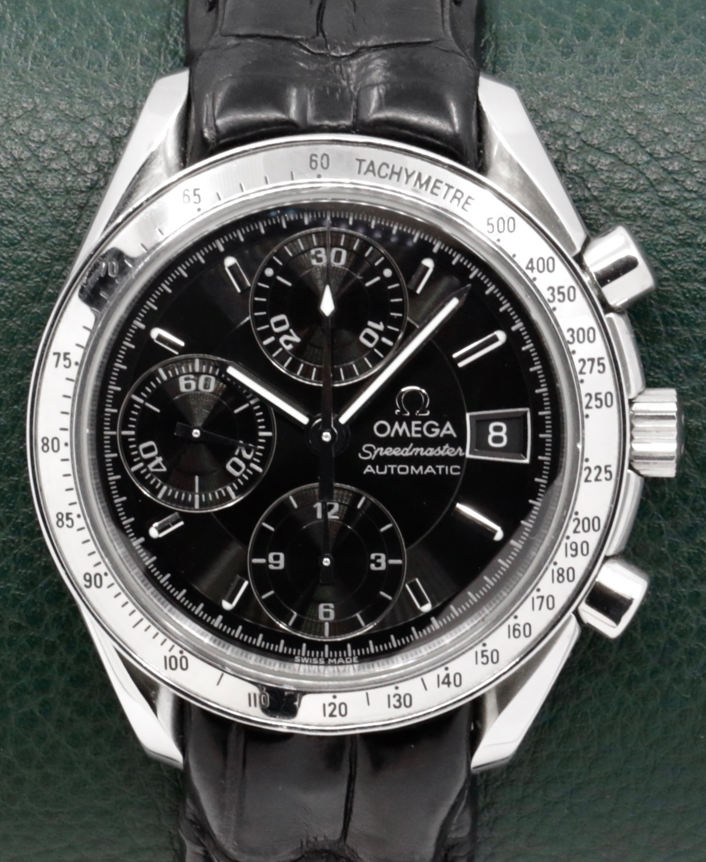 Omega Speedmaster Automatic with Date, Stainless Steel, Black Index & Black Sub Dials, on Black Omega Alligator Leather Strap with Stainless Steel Omega Deployant, Ref. 38135000, Circa: 1999, with Omega Booklets & Omega Warranty Card - $2,800 - Image 2