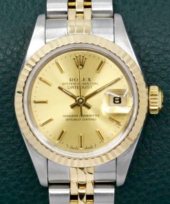 Rolex Lady-Datejust 26, in Stainless Steel & 18ct Yellow Gold, Fluted Bezel, Champagne Index Dial, on Stainless Steel & 18ct Yellow Gold Rolex Jubilee Bracelet, Ref. 69173, Circa: 1991