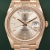 Rolex Day-Date 40, in 18ct Everose Gold, with Factory Set Sundust Baguette Diamond Dial, on 18ct Everose Gold Rolex President Bracelet, Ref. 228235, Circa: 2019, with Box, Books, Rolex Warranty Card, Rolex Service Card & Balance of 2 Year Rolex Service Warranty