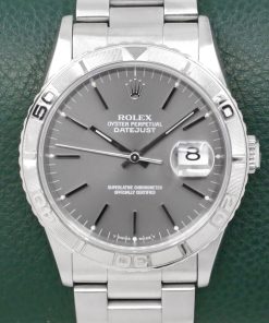 Rolex Oyster Perpetual Datejust 36 Turn-O-Graph, "Thunderbird" with Rotating Bezel, in Stainless Steel, Rhodium Index Dial, on Stainless Steel Rolex Oyster Bracelet, Ref.16264, 1997, with Box, Books, & Rolex Warranty Certificate. $9,900