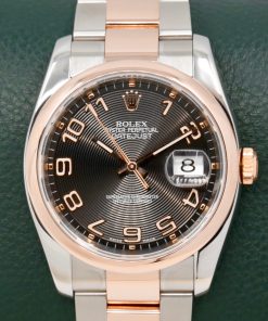 Rolex Datejust 36 in steel and 18ct Everose gold, smooth Everose gold bezel, Black concentric Arab dial on a Rolex steel and Everose gold Oyster bracelet. Ref: 116201, Box, Book and Rolex Warranty Card. Ca. 2011, $13850