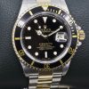 Rolex Oyster Perpetual Submariner Date, in Stainless Steel & 18ct Yellow Gold, Black Index Dial, on Stainless Steel & 18ct Yellow Gold Rolex Oyster Bracelet, Ref. 16613, Circa: 2002, with Box, books, Swing Tag, Anchor, and Rolex Warranty certificate