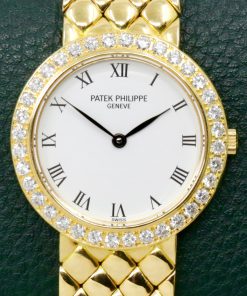 Patek Philippe Ladies Wristwatch, in 18ct Yellow Gold, White Roman Dial, on a integrated 18ct Yellow Gold Patek Philippe Bracelet, Ref. 4820/1, Ca.2000,  Watch Only, $12,500