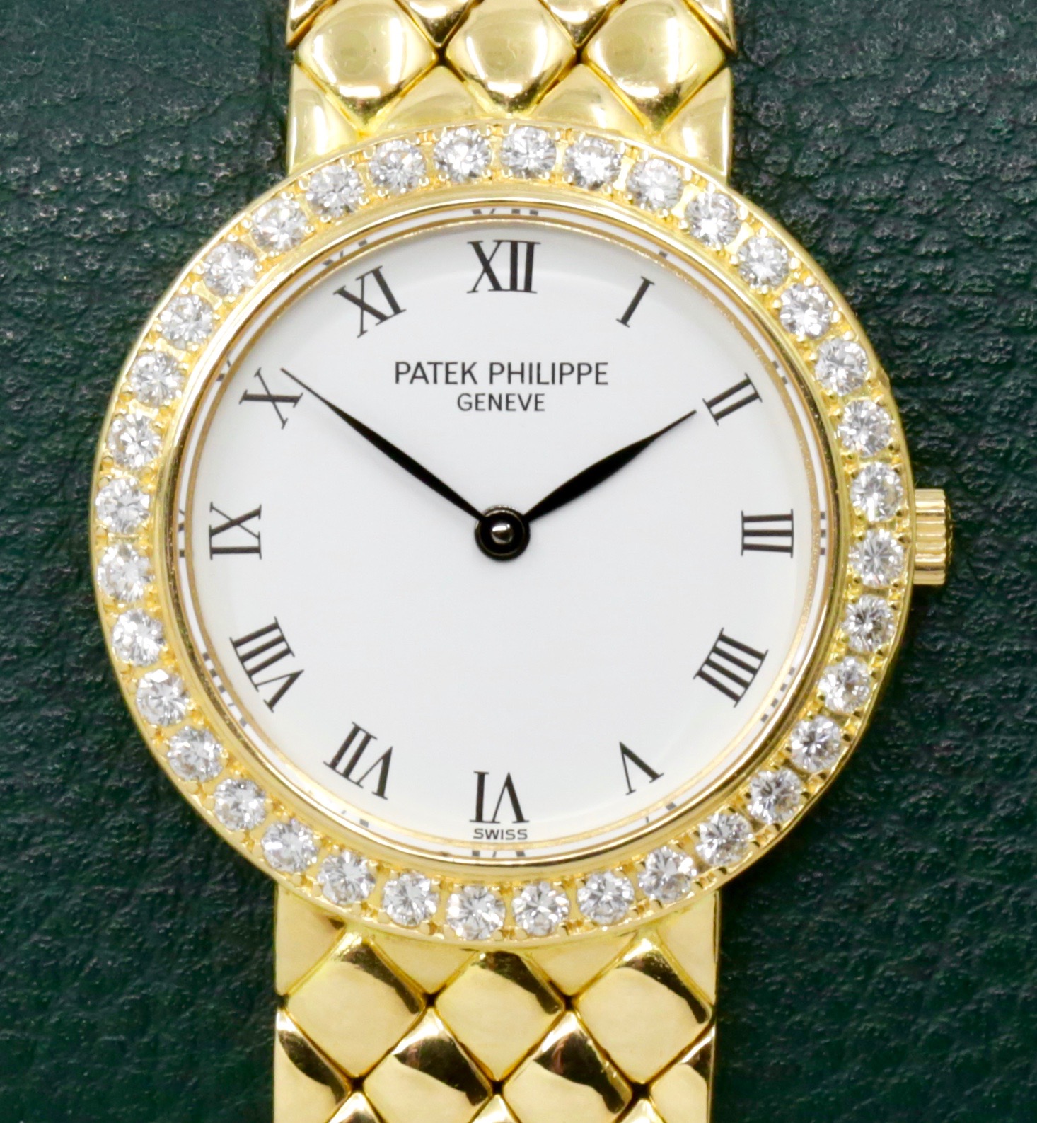 Patek Philippe Ladies Wristwatch, in 18ct Yellow Gold, White Roman Dial, on a integrated 18ct Yellow Gold Patek Philippe Bracelet, Ref. 4820/1, Ca.2000, Watch Only, $12,500