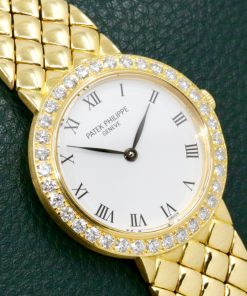 Alternative view of Patek Philippe Ladies Wristwatch, in 18ct Yellow Gold, White Roman Dial, on a integrated 18ct Yellow Gold Patek Philippe Bracelet, Ref. 4820/1, Ca.2000,  Watch Only, $12,500