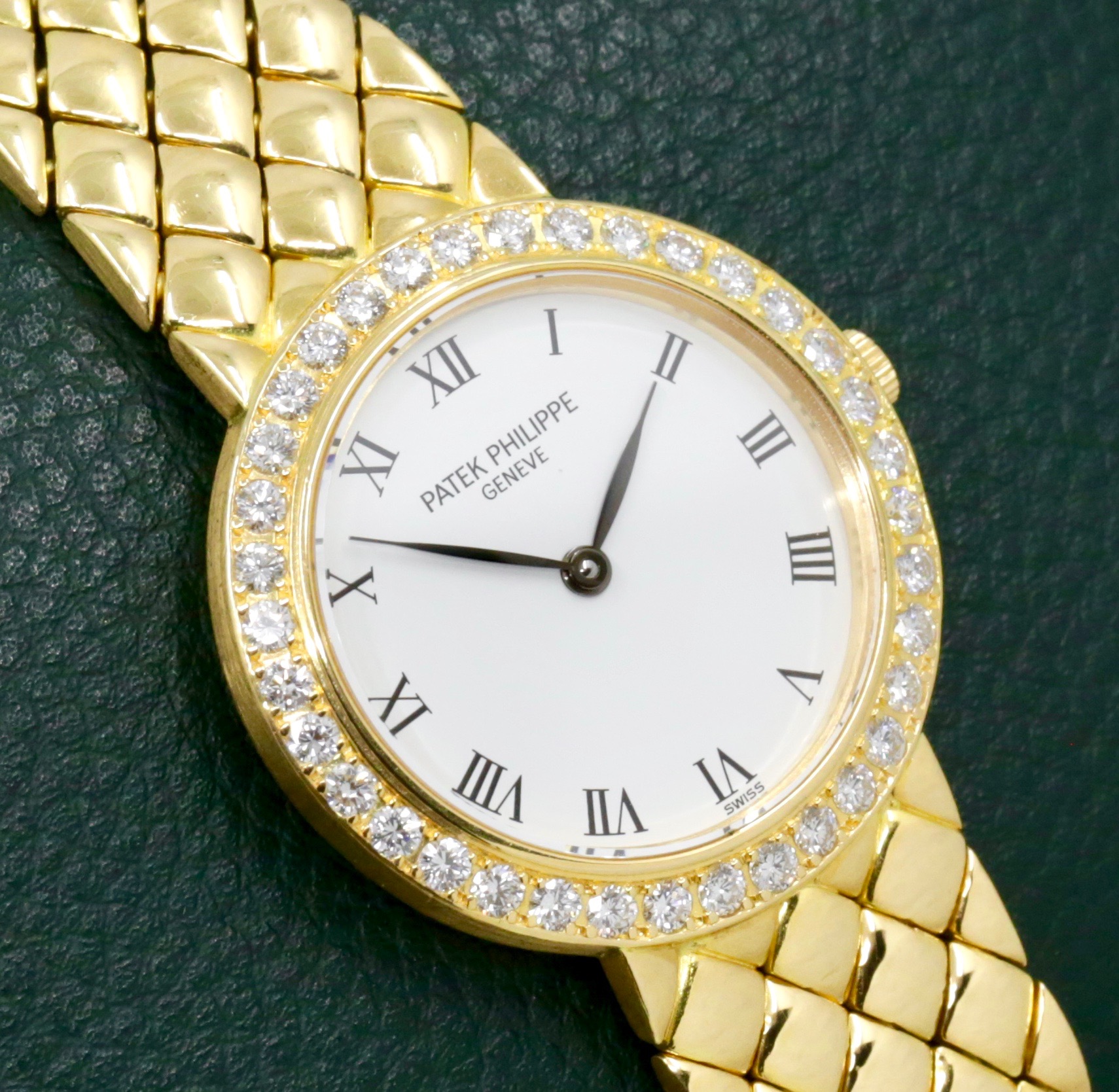 Patek Philippe Ladies Wristwatch, in 18ct Yellow Gold, White Roman Dial, on a integrated 18ct Yellow Gold Patek Philippe Bracelet, Ref. 4820/1, Ca.2000, Watch Only, $12,500 - Image 2