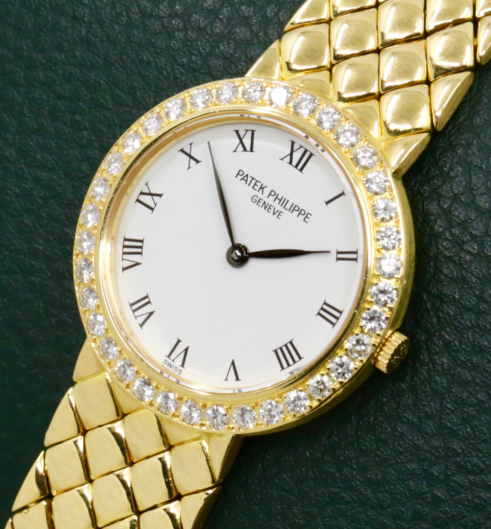 Patek Philippe Ladies Wristwatch, in 18ct Yellow Gold, White Roman Dial, on a integrated 18ct Yellow Gold Patek Philippe Bracelet, Ref. 4820/1, Ca.2000, Watch Only, $12,500 - Image 3