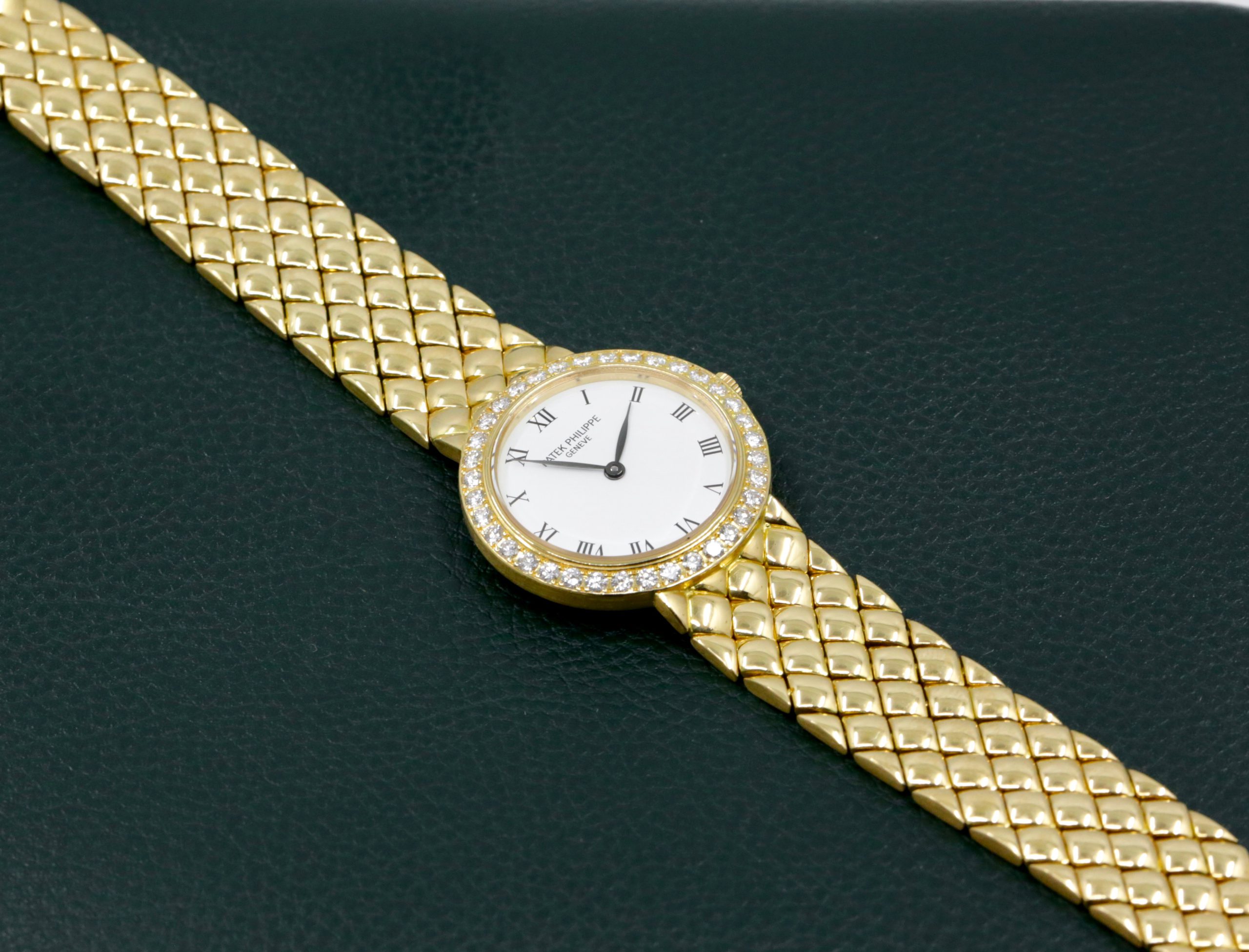 Patek Philippe Ladies Wristwatch, in 18ct Yellow Gold, White Roman Dial, on a integrated 18ct Yellow Gold Patek Philippe Bracelet, Ref. 4820/1, Ca.2000, Watch Only, $12,500 - Image 5