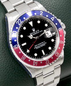Rolex Oyster Perpetual GMT-Master II, Stainless Steel, Blue & Red "Pepsi" Bezel, Black Index Dial, on Stainless Steel Rolex Oyster Bracelet, Ref. 16710, Circa: 2002, with Rolex Box, Rolex Service Card & Balance of 2 Year Rolex Service Warranty