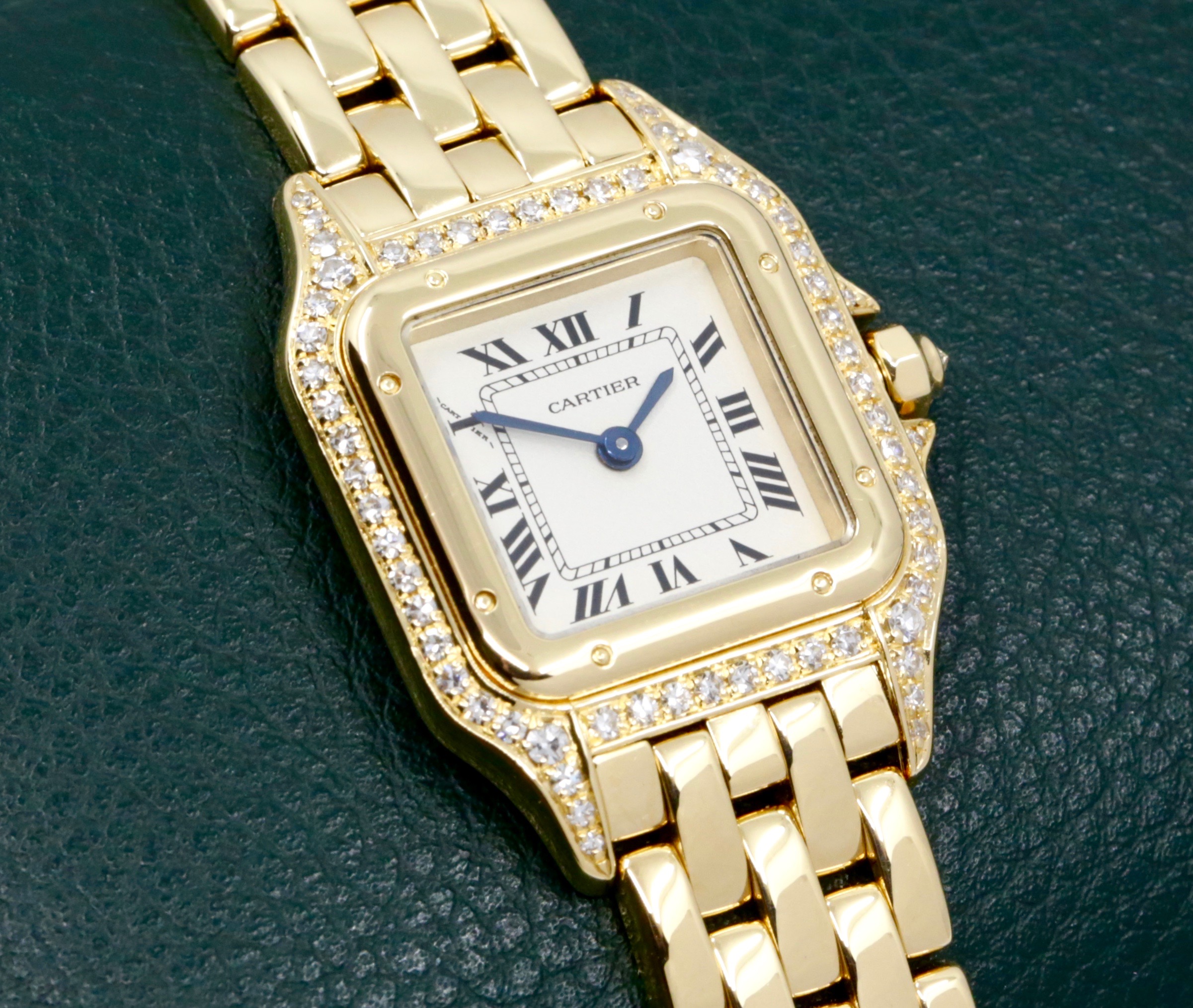 Cartier - Panthere de Cartier, in 18ct Yellow Gold, Silver Roman Dial, Factory Set Diamond Bezel & Lugs, on 18ct Yellow Gold Cartier Bracelet, Ref. 12802, Circa: February 1995, with Box, Book, Cartier Warranty Certificate, & Balance of 2 Year Cartier Service Warranty