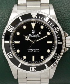 Rolex Submariner Non-Date in Stainless Steel, Black Index Dial, on Stainless Steel Rolex Oyster Bracelet, Ref. 14060, Circa: 1993, with Box, Books, Swing Tag, & Rolex Warranty Certificate