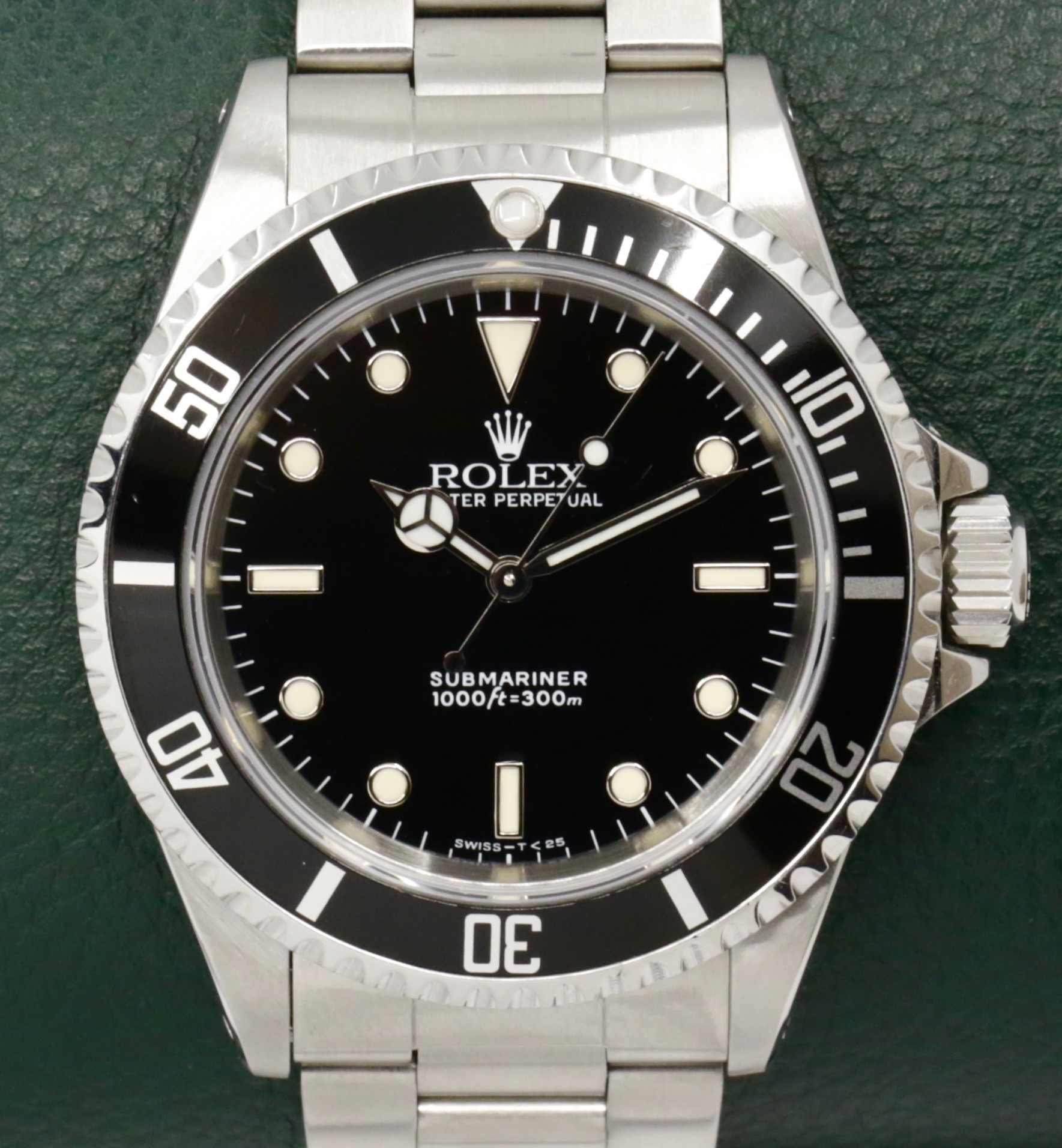 Rolex Submariner Non-Date in Stainless Steel, Black Index Dial, on Stainless Steel Rolex Oyster Bracelet, Ref. 14060, Circa: 1993, with Box, Books, Swing Tag, & Rolex Warranty Certificate