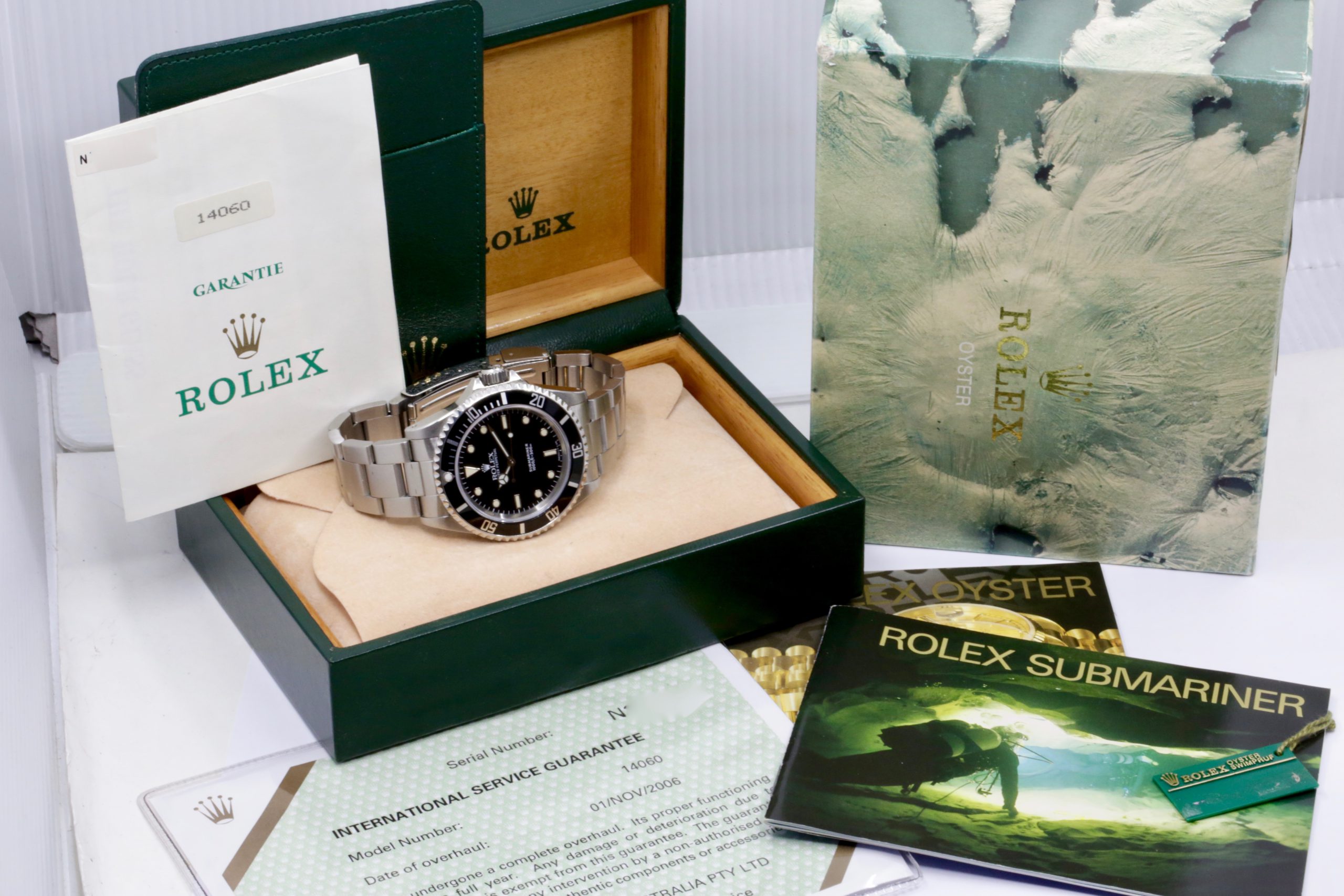 Rolex Submariner Non-Date in Stainless Steel, Black Index Dial, on Stainless Steel Rolex Oyster Bracelet, Ref. 14060, Circa: 1993, with Box, Books, Swing Tag, & Rolex Warranty Certificate - Image 7