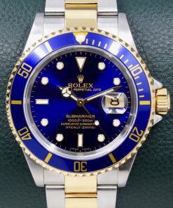 Rolex Submariner Date, Stainless Steel & 18ct Yellow Gold, Blue Index Dial, on Stainless Steel & 18ct Yellow Gold Rolex Oyster Bracelet, Ref. 16613, Circa: 2003, with Box, Books, & Rolex Warranty Certificate