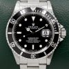 Rolex Submariner Date, Stainless Steel, Black Index Dial, Black Aluminum Bezel, on Stainless Steel Rolex Oyster Bracelet, Ref. 16610, Circa: 1996, with Box, Swing Tag, & Book