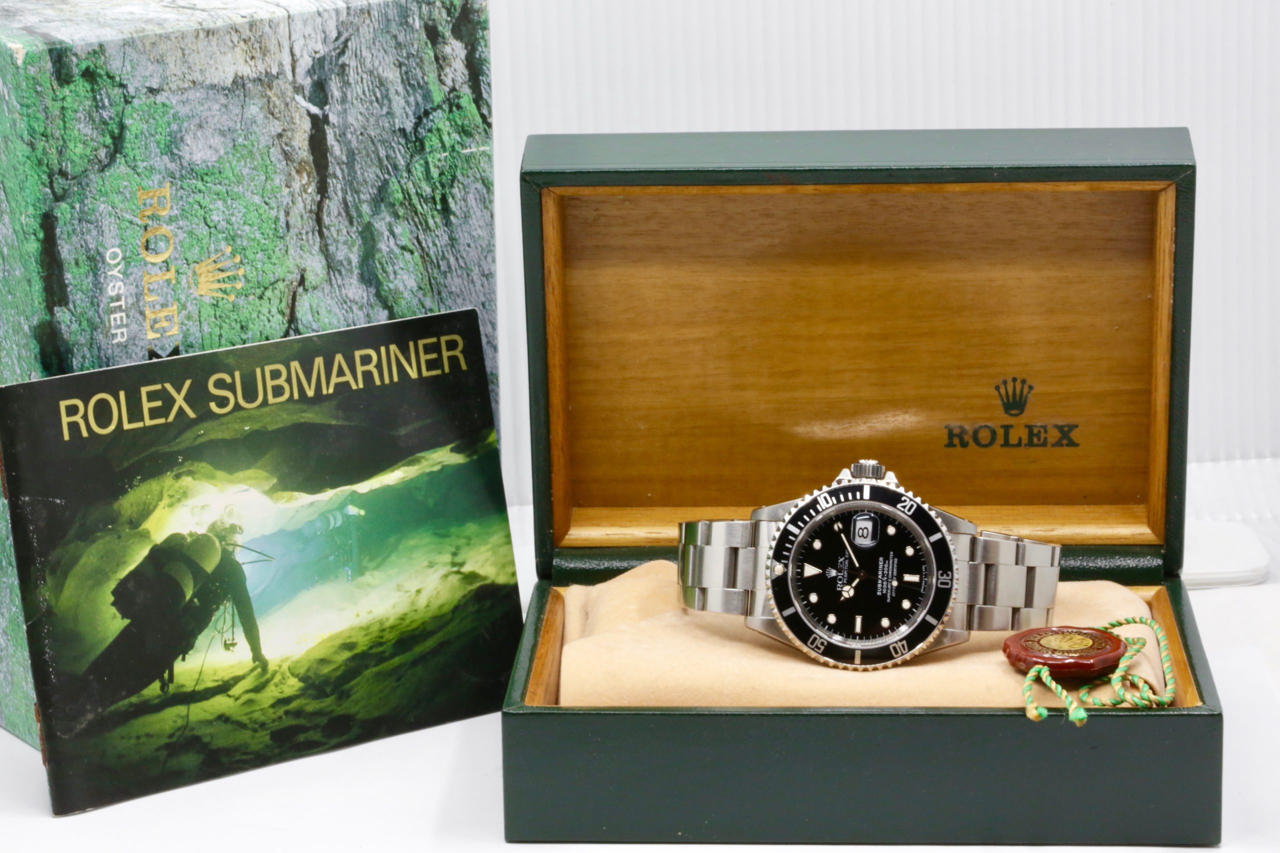 Rolex Submariner Date, Stainless Steel, Black Index Dial, Black Aluminum Bezel, on Stainless Steel Rolex Oyster Bracelet, Ref. 16610, Circa: 1996, with Box, Swing Tag, & Book - Image 7