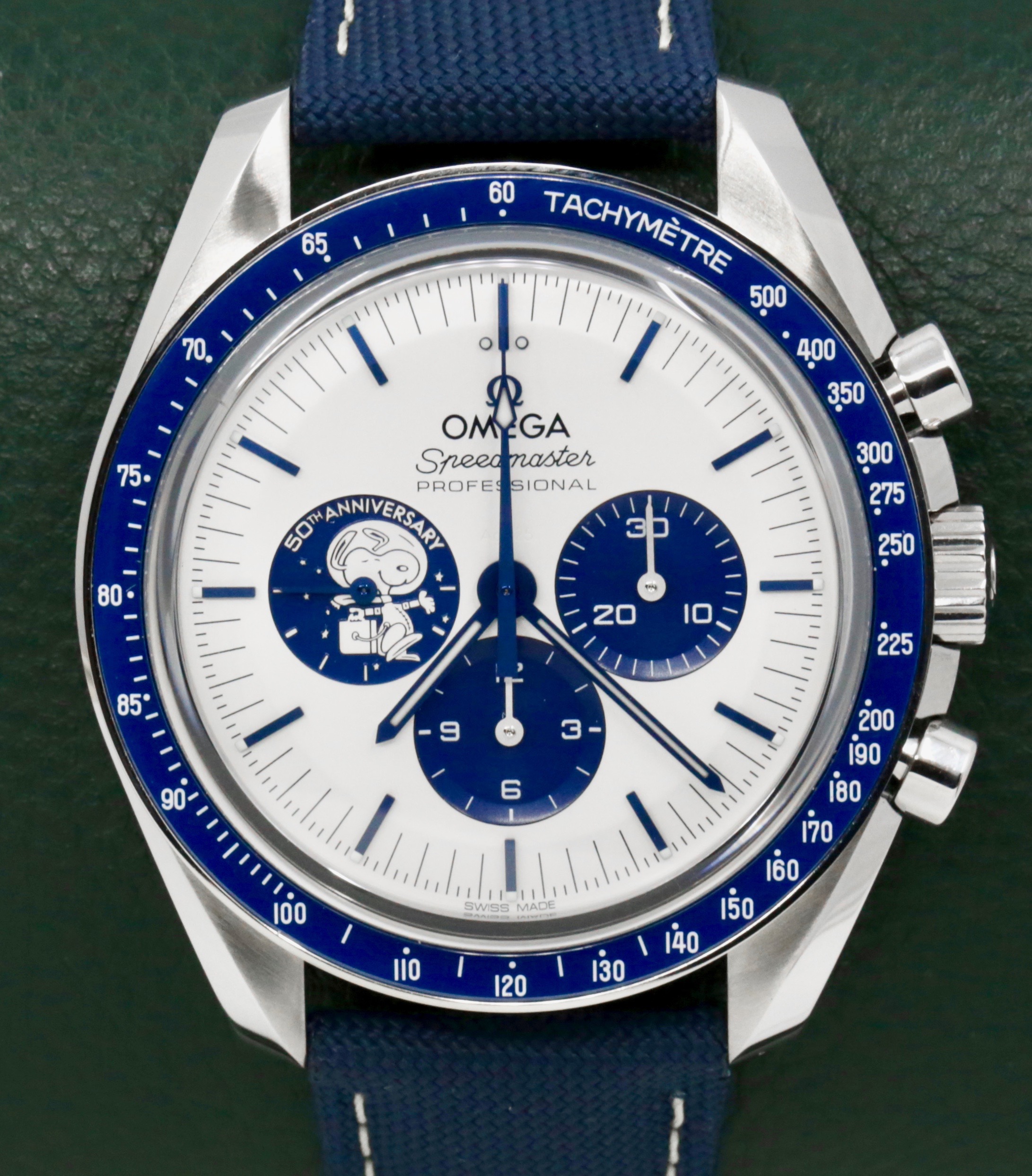 Omega Speedmaster Anniversary Series "Silver Snoopy Award", in Stainless Steel on Nylon Fabric Strap, Silver dial with Blue Sub Dials, Ref. 310.32.42.50.02.001, Circa: 2023, with Box, Books, Omega Warranty Cards, & Balance of 5 Year Omega Factory Warranty