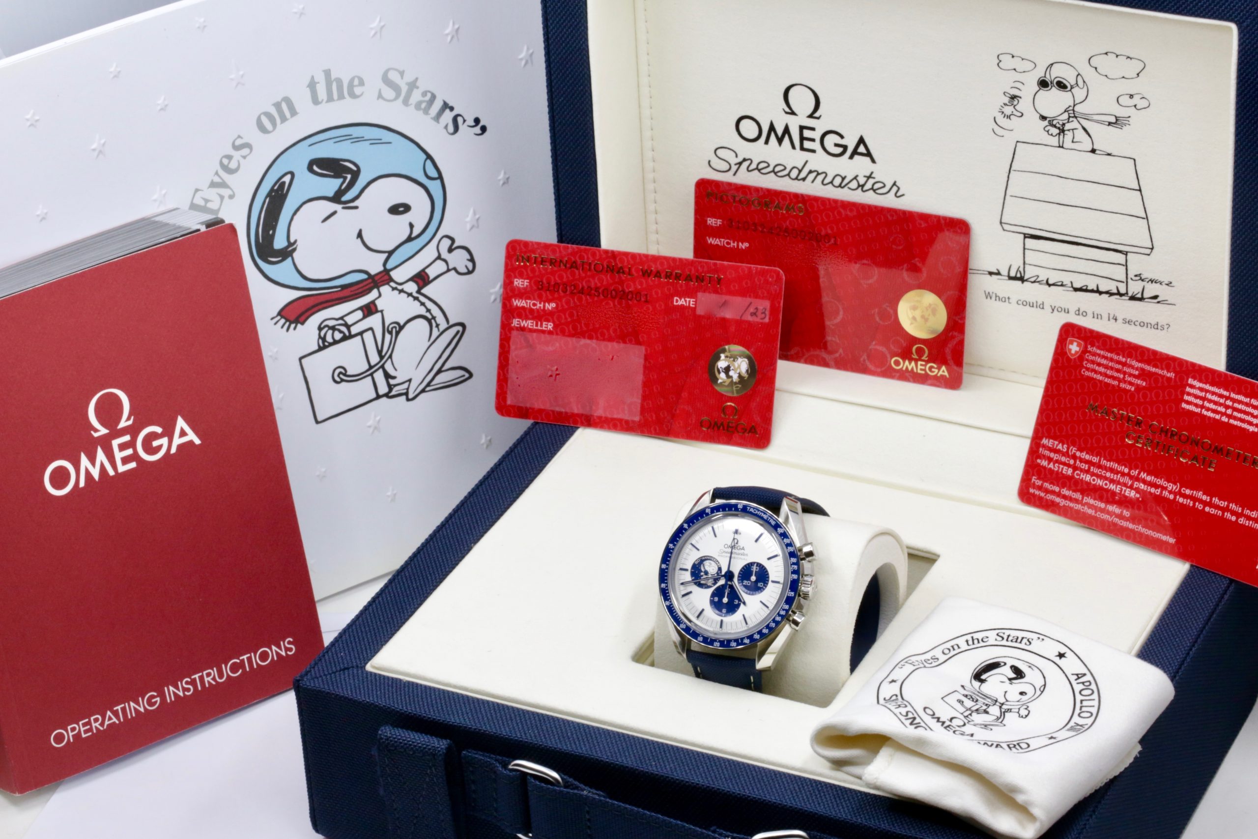 Omega Speedmaster Anniversary Series "Silver Snoopy Award", in Stainless Steel on Nylon Fabric Strap, Silver dial with Blue Sub Dials, Ref. 310.32.42.50.02.001, Circa: 2023, with Box, Books, Omega Warranty Cards, & Balance of 5 Year Omega Factory Warranty - Image 7