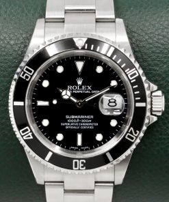 Rolex Submariner Date, Stainless Steel, Black Index Dial, Black Aluminum Bezel, on Stainless Steel Rolex Oyster Bracelet, Ref. 16610, Circa: 2006,  with Box, Books, Swing Tags, & Rolex Warranty Certificate
