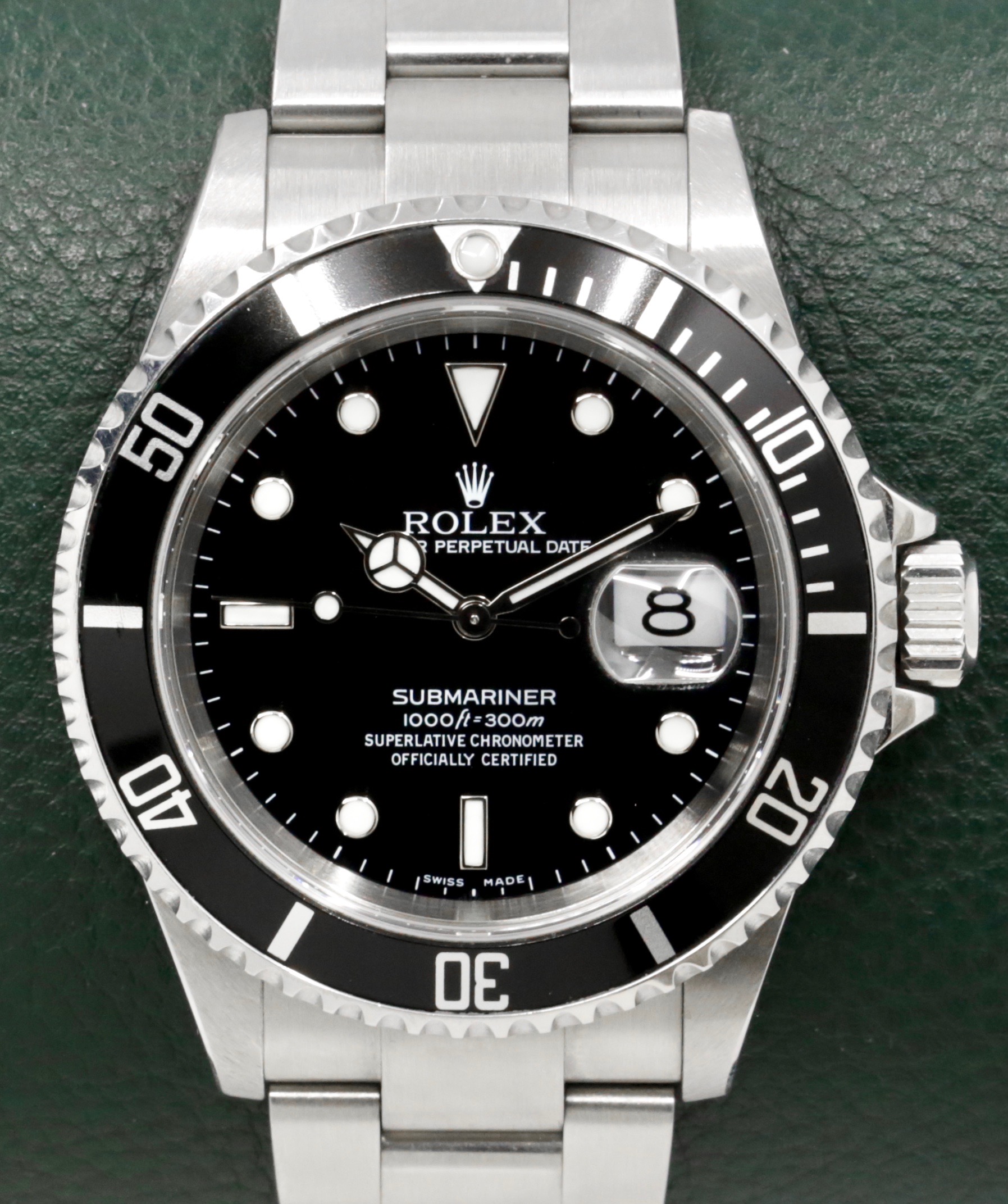 Rolex Submariner Date, Stainless Steel, Black Index Dial, Black Aluminum Bezel, on Stainless Steel Rolex Oyster Bracelet, Ref. 16610, Circa: 2006, with Box, Books, Swing Tags, & Rolex Warranty Certificate