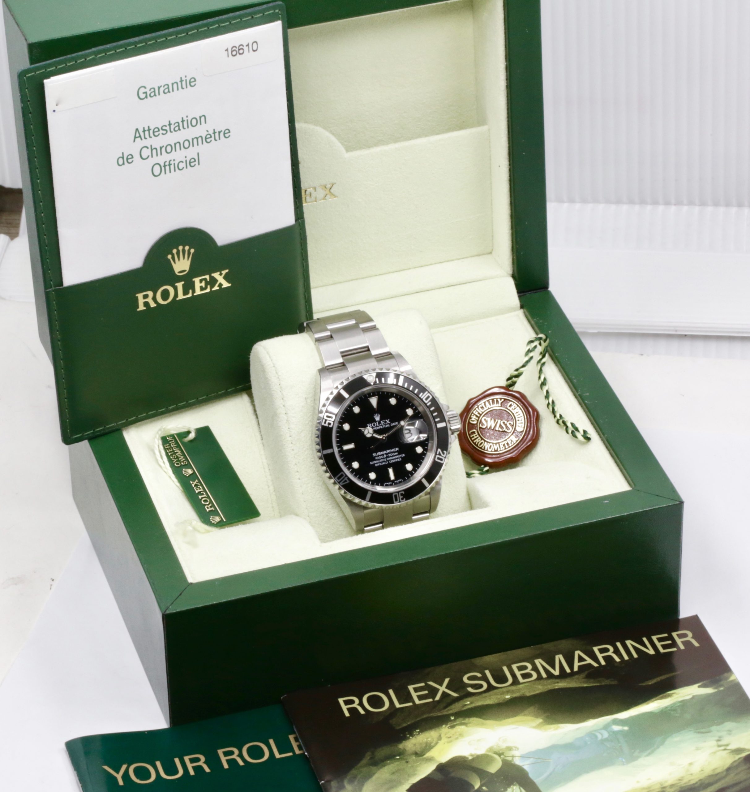 Rolex Submariner Date, Stainless Steel, Black Index Dial, Black Aluminum Bezel, on Stainless Steel Rolex Oyster Bracelet, Ref. 16610, Circa: 2006, with Box, Books, Swing Tags, & Rolex Warranty Certificate - Image 7