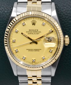 Rolex Oyster Perpetual Datejust in Stainless Steel & 18ct Yellow Gold, Fluted Bezel, Factory Set Champagne Diamond Dial, on Stainless Steel & 18ct Yellow Gold Rolex Jubilee Bracelet, Ref. 16013, Circa: 1986, Box & Books, Rolex Service Card