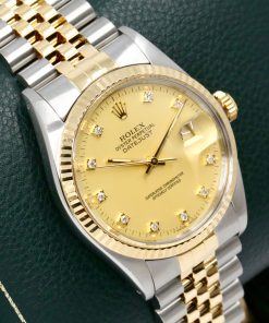 Alternative view of Rolex Oyster Perpetual Datejust in Stainless Steel & 18ct Yellow Gold, Fluted Bezel, Factory Set Champagne Diamond Dial, on Stainless Steel & 18ct Yellow Gold Rolex Jubilee Bracelet, Ref. 16013, Circa: 1986, Box & Books, Rolex Service Card