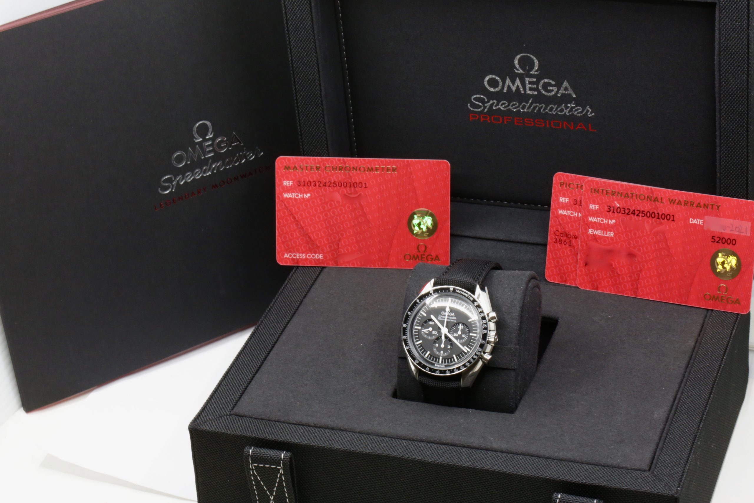 Omega Speedmaster Professional, "Moonwatch", Stainless Steel, Black Index Dial, Hesalite Crystal, on Black Omega Fabric Strap with Stainless Steel Omega Deployant, Ref. 310.32.42.50.01.001, Circa: 2021, with Box, Book, Omega Warranty Card & Balance of 5 Year Omega Factory Warranty - Image 8