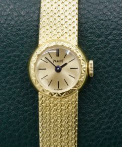 Alternative view of Piaget lady Cocktail Watch in 18ct Yellow Gold, Champagne index dial on a 18ct gold integrated woven bracelet with folding clasp. Ref: 6573, with the original Piaget Box. CIRCA 1954.