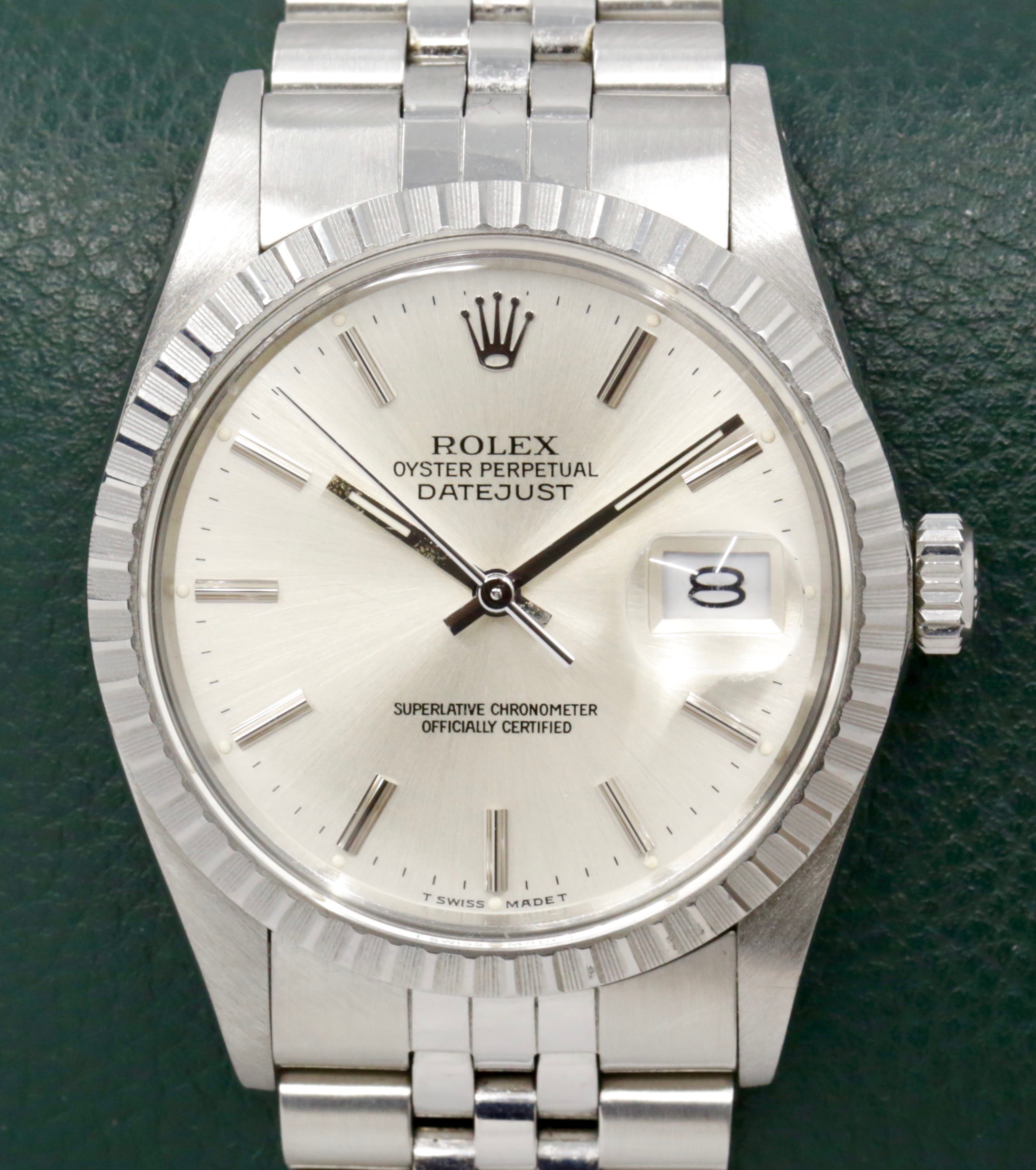 Rolex Oyster Perpetual Datejust, Stainless Steel, Notched Bezel, Silver Index Dial, on Stainless Steel Rolex Jubilee Bracelet, Ref. 16030, Circa: 1987