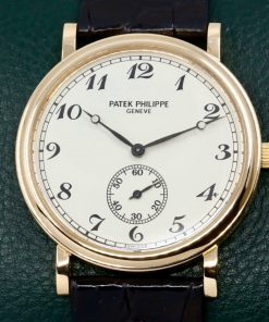 Patek Philippe Calatrava in 18ct Yellow Gold, Silver Dial with Breguet Markers, on Black Alligator Leather Strap with a Patek Philippe 18ct Yellow Gold Tang Buckle, Manual-Winding Calibre 215 PS,  Ref: 5022J  Ca: 2000