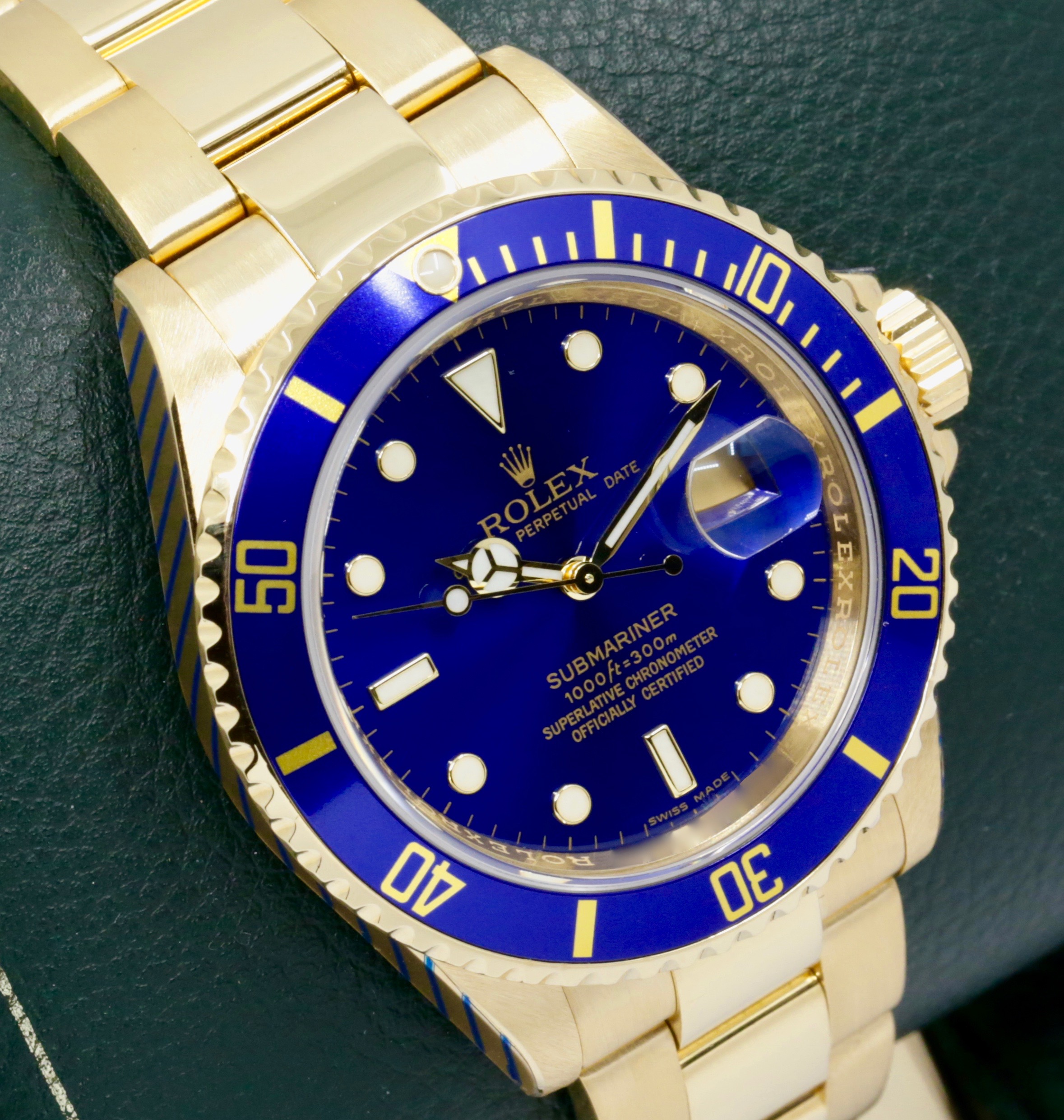 Rolex Oyster Perpetual Submariner Date, in 18ct Yellow Gold, with Blue Index Dial, Blue Aluminum Bezel, on 18ct Yellow Gold Rolex Oyster Bracelet, Ref. 16618, Circa: 2006, with Box, Rolex Service Card & Balance of 2 Year Rolex Service Warranty - Image 2