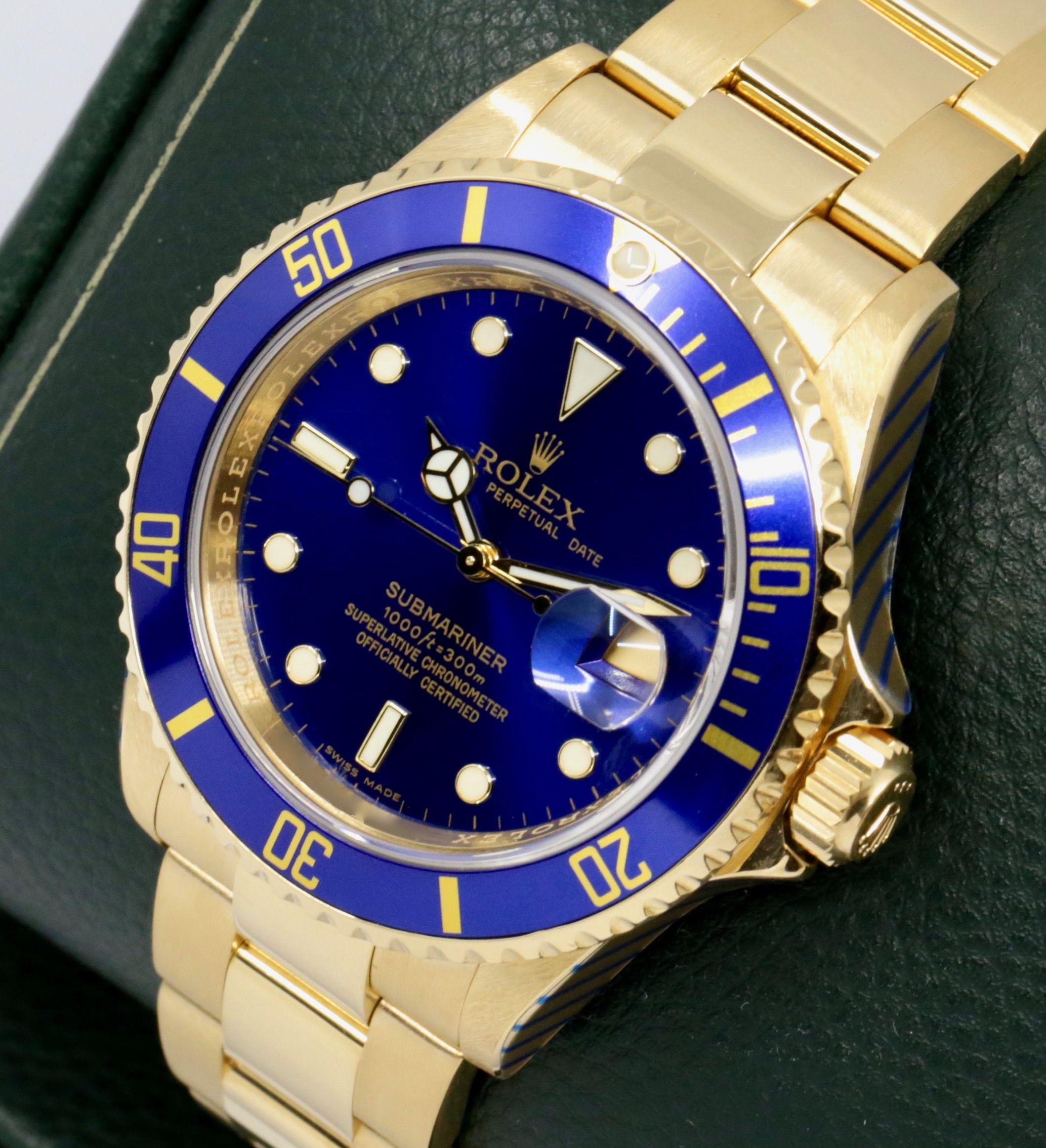 Rolex Oyster Perpetual Submariner Date, in 18ct Yellow Gold, with Blue Index Dial, Blue Aluminum Bezel, on 18ct Yellow Gold Rolex Oyster Bracelet, Ref. 16618, Circa: 2006, with Box, Rolex Service Card & Balance of 2 Year Rolex Service Warranty - Image 3