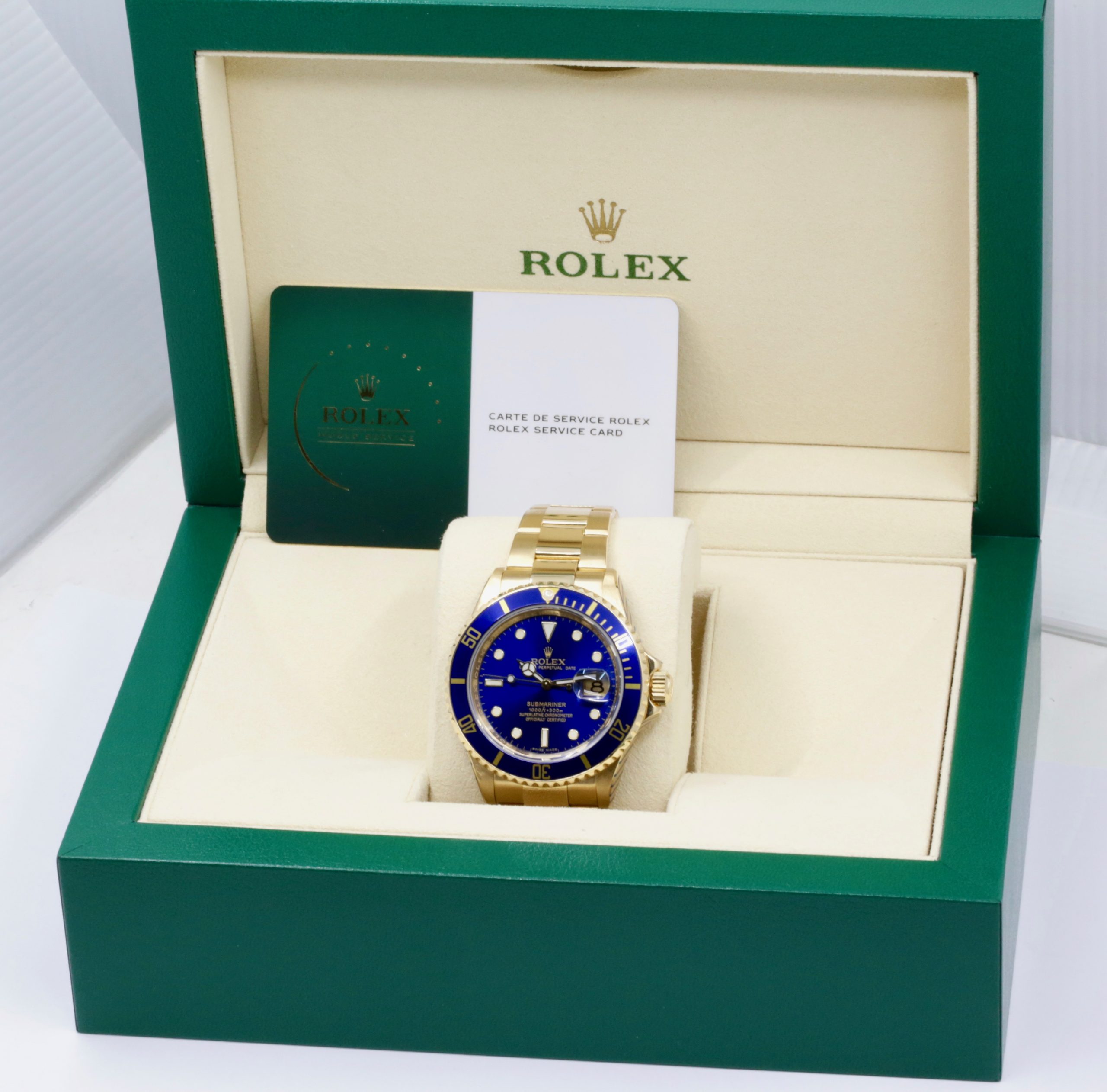 Rolex Oyster Perpetual Submariner Date, in 18ct Yellow Gold, with Blue Index Dial, Blue Aluminum Bezel, on 18ct Yellow Gold Rolex Oyster Bracelet, Ref. 16618, Circa: 2006, with Box, Rolex Service Card & Balance of 2 Year Rolex Service Warranty - Image 7