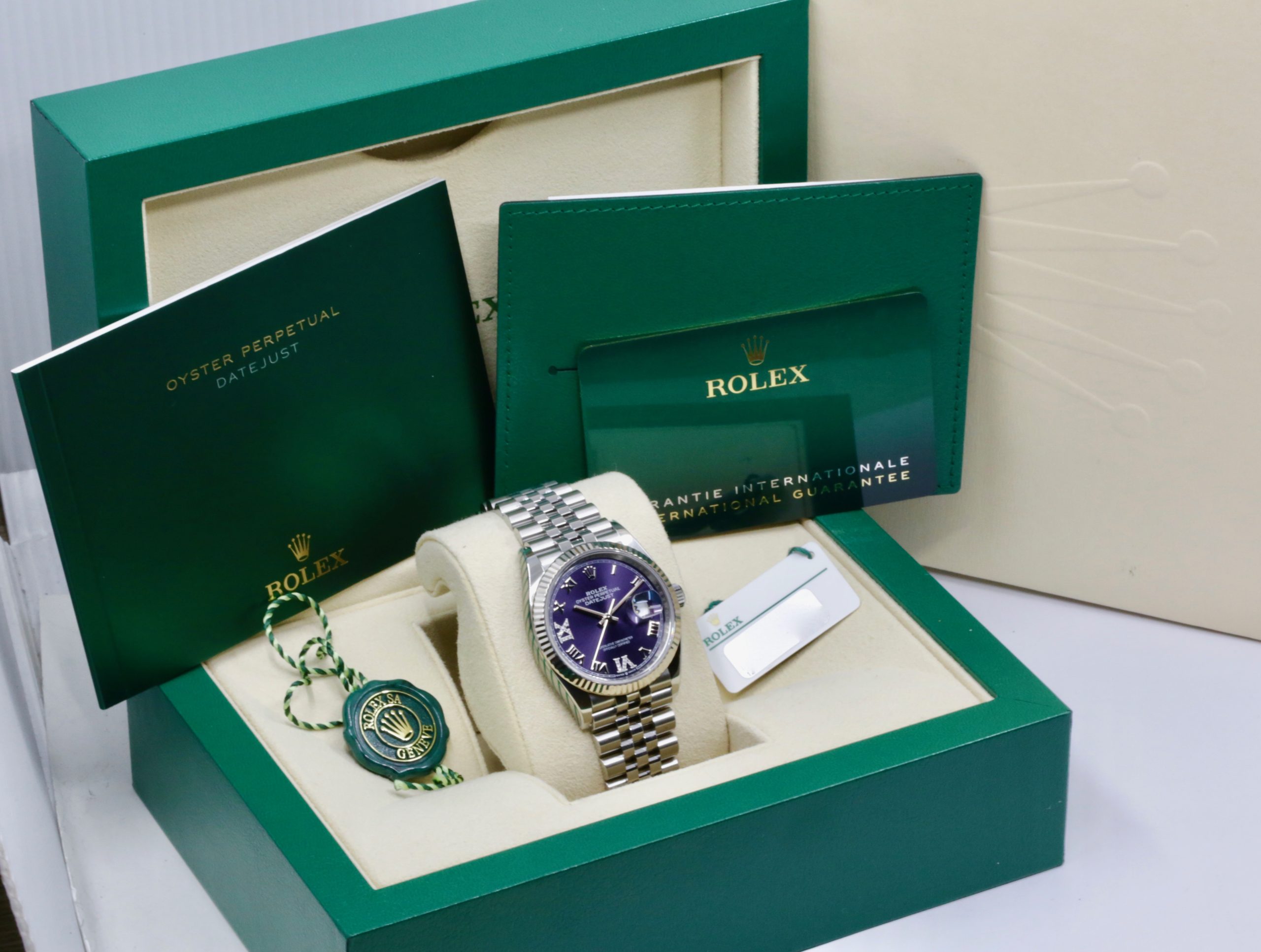 Rolex Oyster Perpetual Datejust 36 in Stainless Steel,18ct White Gold Fluted Bezel, Purple Roman Dial with Factory Set Diamonds on 6 & 9, Rolex Jubilee Bracelet, Ref. 126234, Ca: 2020, Box, Books, Green & White Swing Tags, & Rolex Warranty Card - Image 7