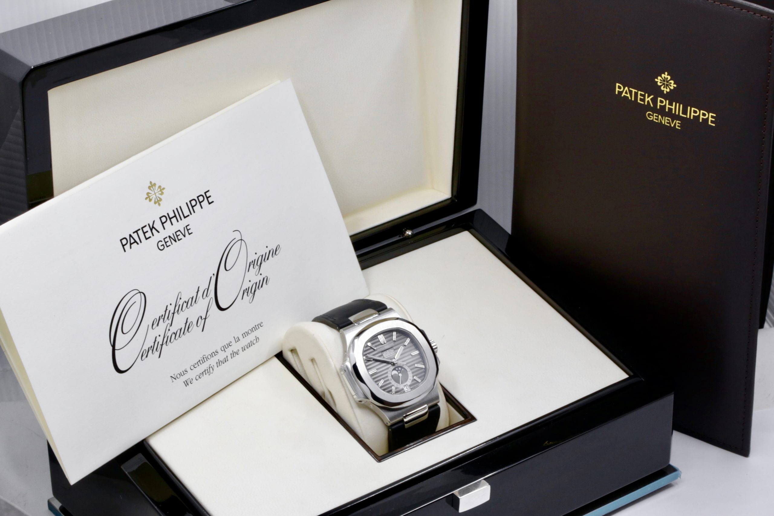 Patek Philippe Nautilus, Annual Calendar & Moon Phase, in Stainless Steel, Black Index Dial, on Black Patek Philippe Leather Strap with Stainless Steel Patek Philippe Deployant, Ref. 5726A, Circa: 2010, with Box, Papers, & Balance of 2 Year Patek Philippe Service Warranty - Image 7