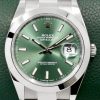 Rolex Datejust 41, Stainless Steel, Mint Green Index Dial, Smooth Bezel, on Stainless Steel Rolex Oyster Bracelet, Ref. 126300, Circa: 2023, with Box, Books, Rolex Warranty Card & Balance of 5 Year Rolex Warranty
