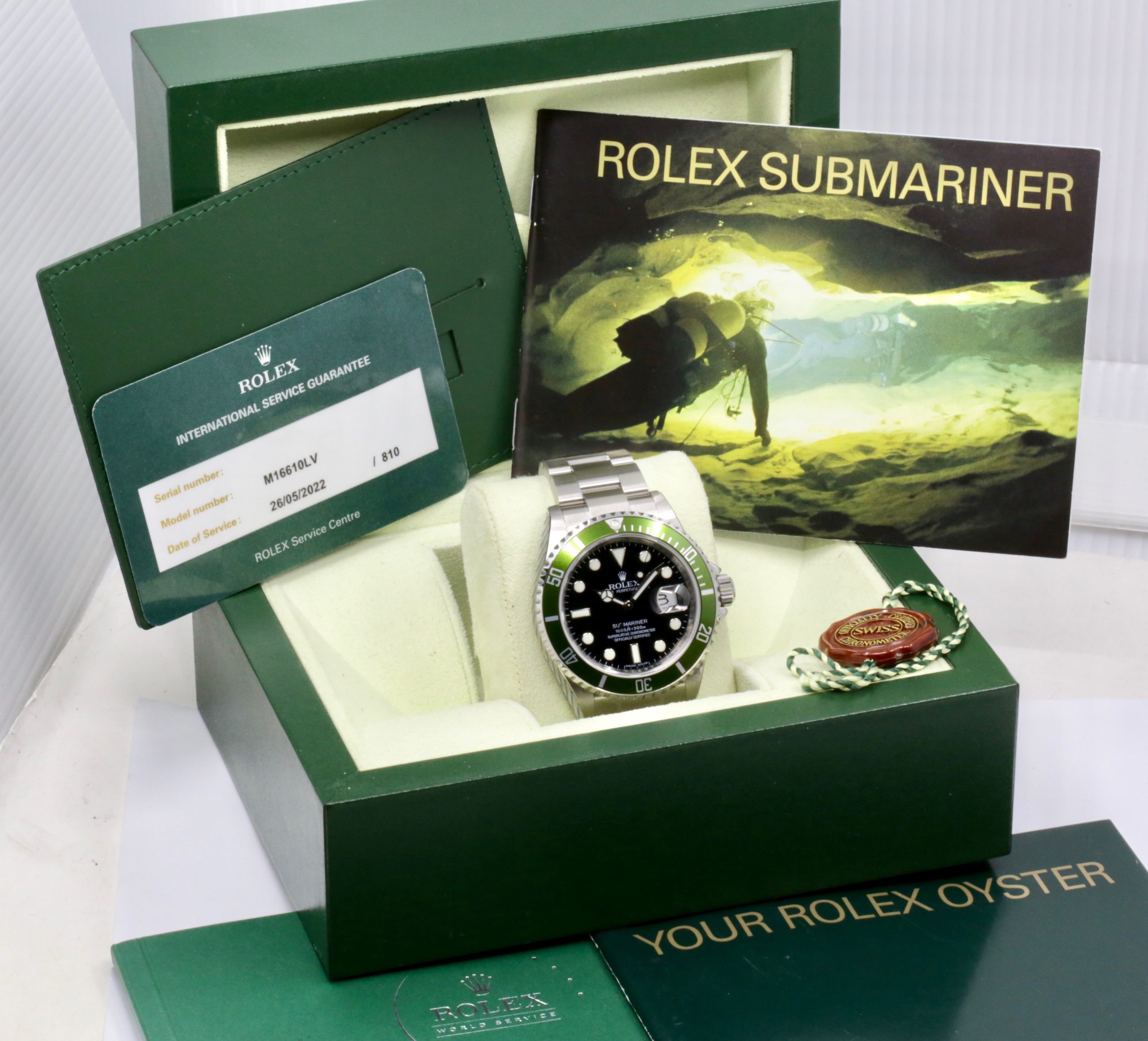 Rolex Oyster Perpetual Submariner Date "Kermit", Stainless Steel, Green Aluminum Bezel, Black Index Dial, on Stainless Steel Rolex Oyster Bracelet, Ref. 16610LV, Sold New in Japan in 2008, with Box, Books, Swing Tag, Rolex Service Card & Original Purchase Receipt - Image 7