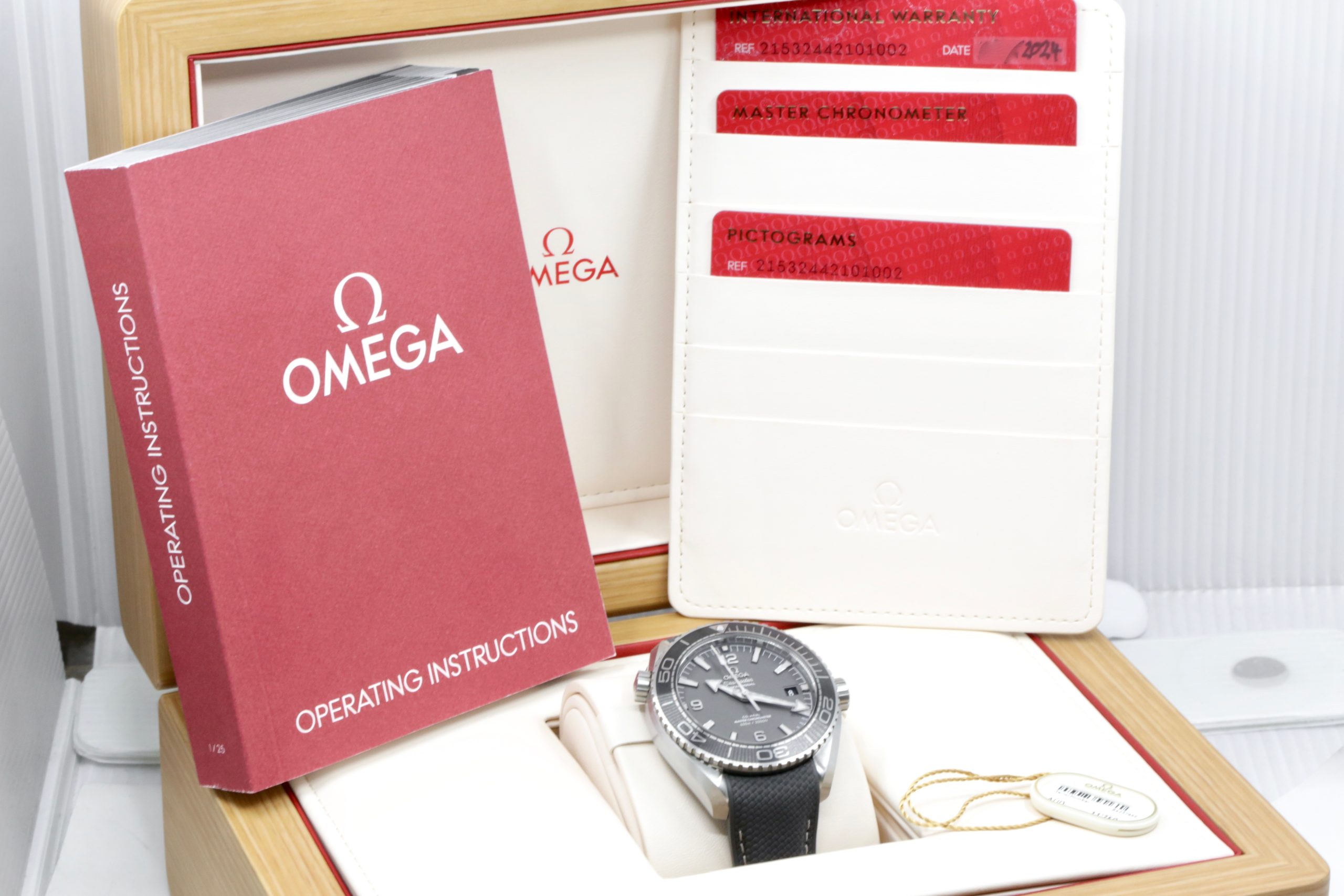 Seamaster Planet Ocean 600M in Stainless Steel, 43.5mm, Grey Arab Index Dial with Date on a Grey Rubber Strap with a Stainless steel Deployant Ref: 215.32.44.21.01.002 ,Ca 2024, Complete with Box, Book, Omega Warranty Cards, & Balance of 5 Year Omega Factory Warranty - Image 8