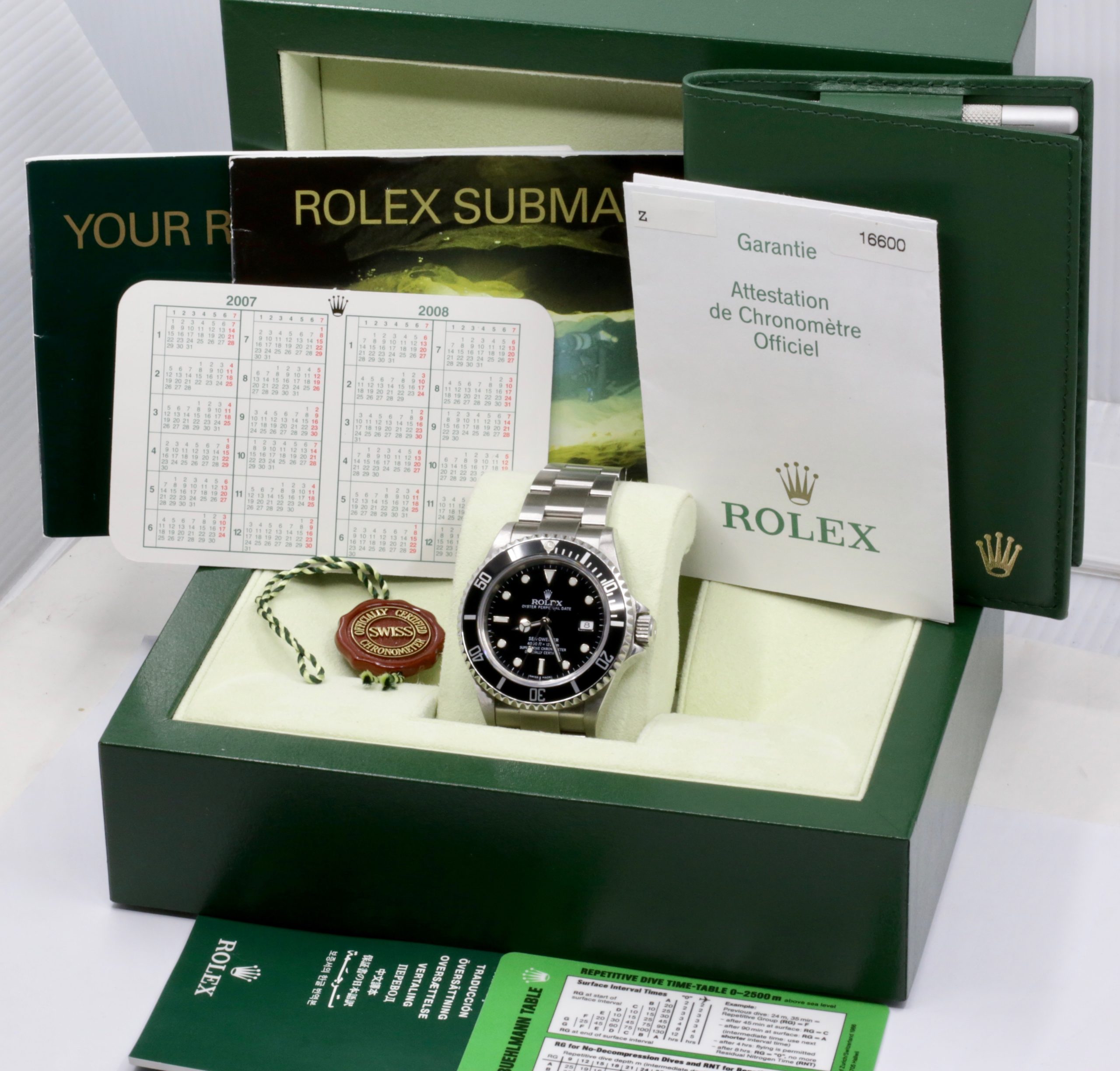 Rolex Oyster Perpetual Sea-Dweller, 1200meter, 40mm, Stainless Steel, Black Index Dial Aluminium Bezel, on a Rolex Stainless Steel Oyster Bracelet, Ref. 16600, Z Series, Circa: 2006, with Box, Books, & Rolex Warranty Card. - Image 6
