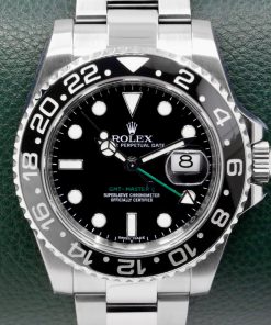 Rolex GMT-Master II "Green Arrow", Stainless Steel, Black Ceramic Bezel, Black Index Dial, on Stainless Steel Rolex Oyster Bracelet, Ref. 116710LN, V Serial, Circa: 2009, with Box, Rolex Translation Booklet, Rolex Service Card & Balance of 2 Year Rolex Service Warranty