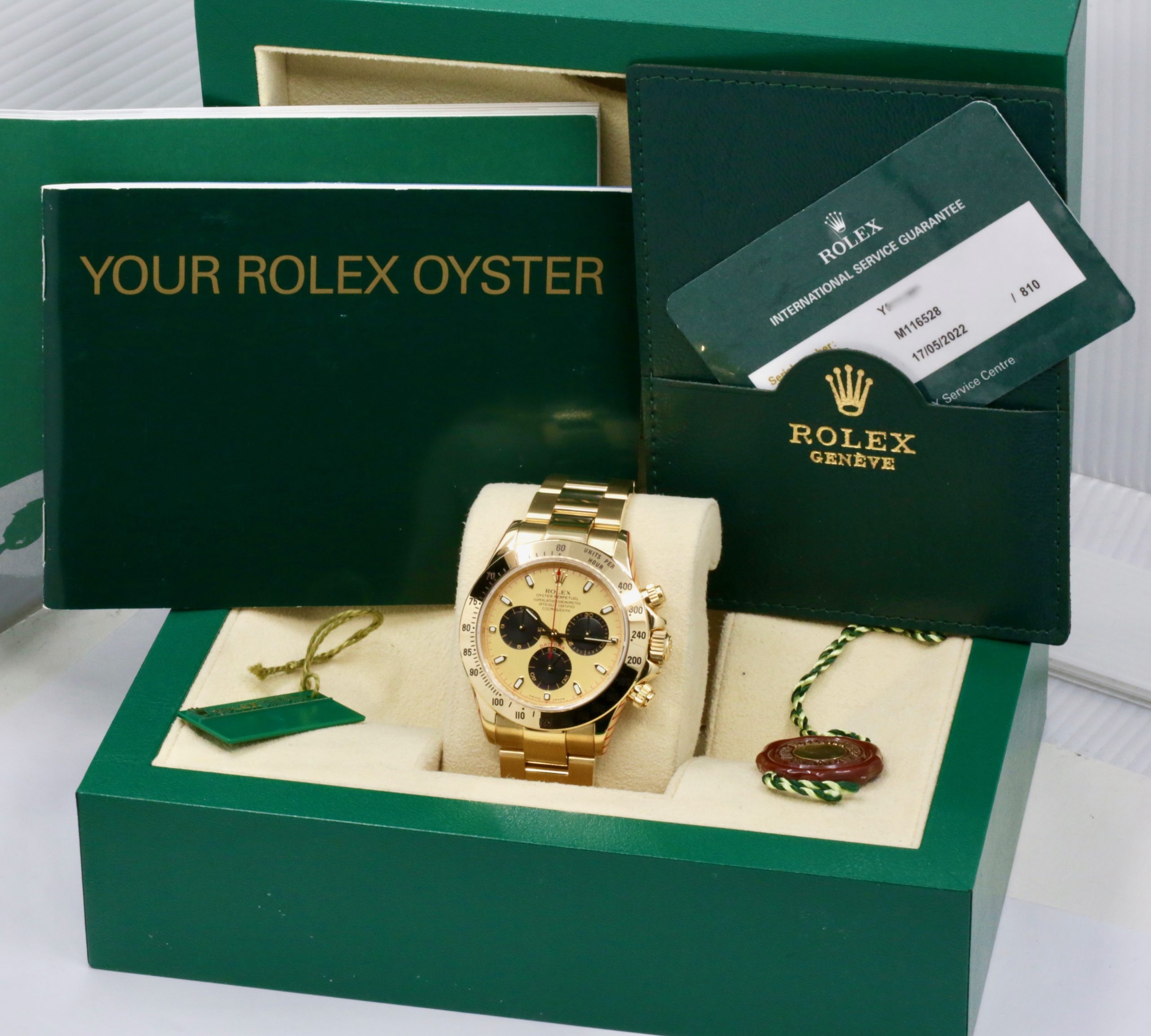 Rolex Cosmograph Daytona, in 18ct Yellow Gold, with "Paul Newman" Champagne Index Dial with Black Sub Dials on 18ct Yellow Gold Rolex Oyster Bracelet, Ref. 116528, Circa: 2002, with Rolex Box, Books, & Rolex Service Card - Image 7