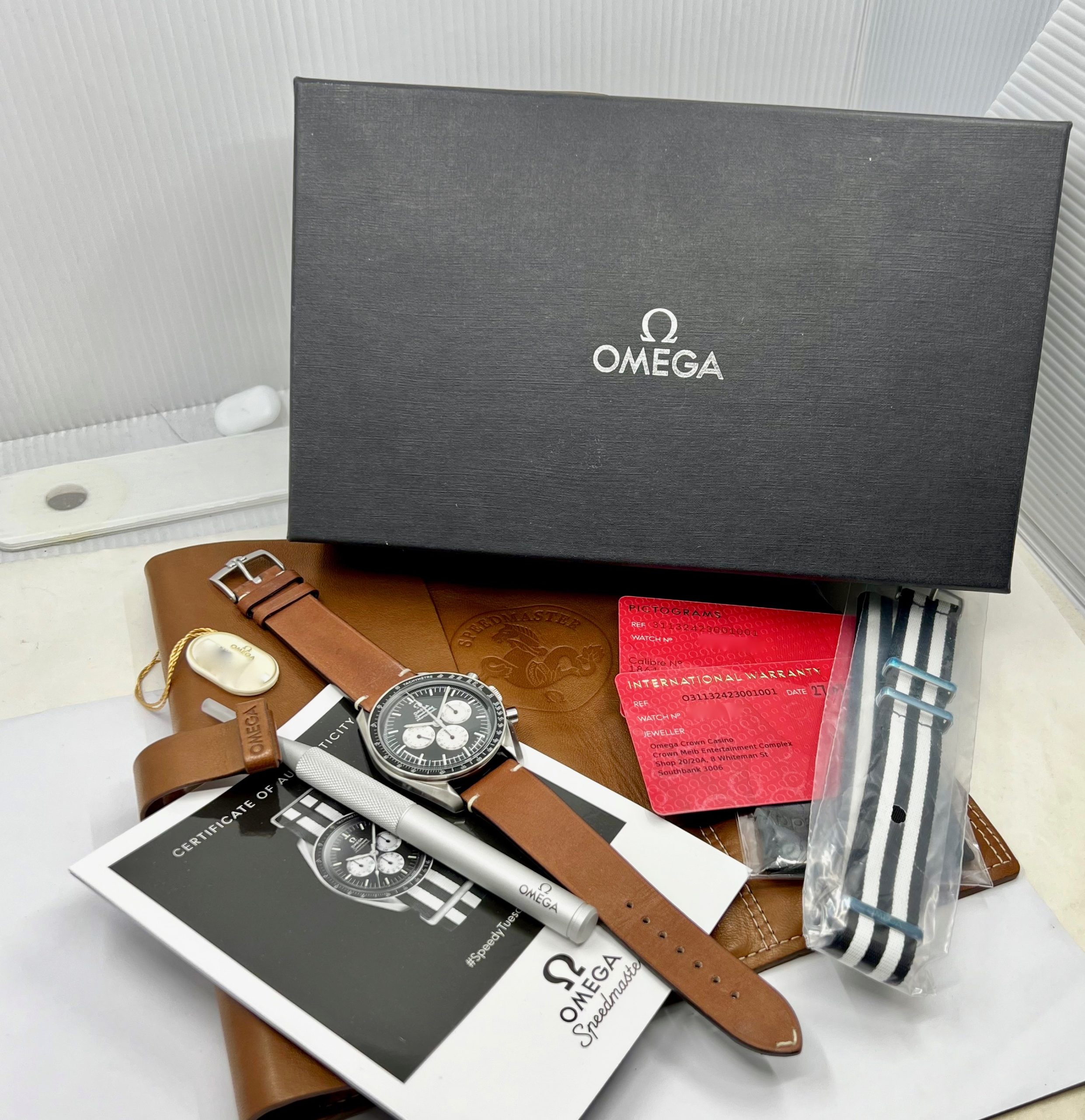 Omega Speedmaster "Speedy Tuesday" Limited Edition, Reverse Panda Black dial with White Sub Dials in Stainless Steel on a Omega Leather band, Ref. 311.32.42.30.01.001, Circa: 2017, with a Omega Tang Buckle, with Box, Books, and Omega Warranty Cards - Image 7