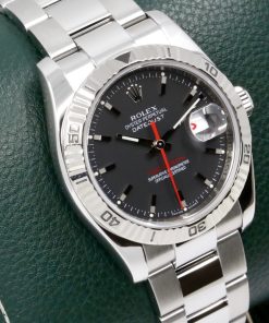 Alternative view of Rolex Oyster Perpetual Datejust Turn-O-Graph, 18ct rotating white gold bezel, in Stainless Steel, Matt Dark Rhodium Index Dial with a red Date wheel, Red Seconds Hand, on Stainless Steel Rolex Oystersteel Bracelet, Ref. 116264, Serial#: Z series Circa: 2007, with Rolex Box & Books