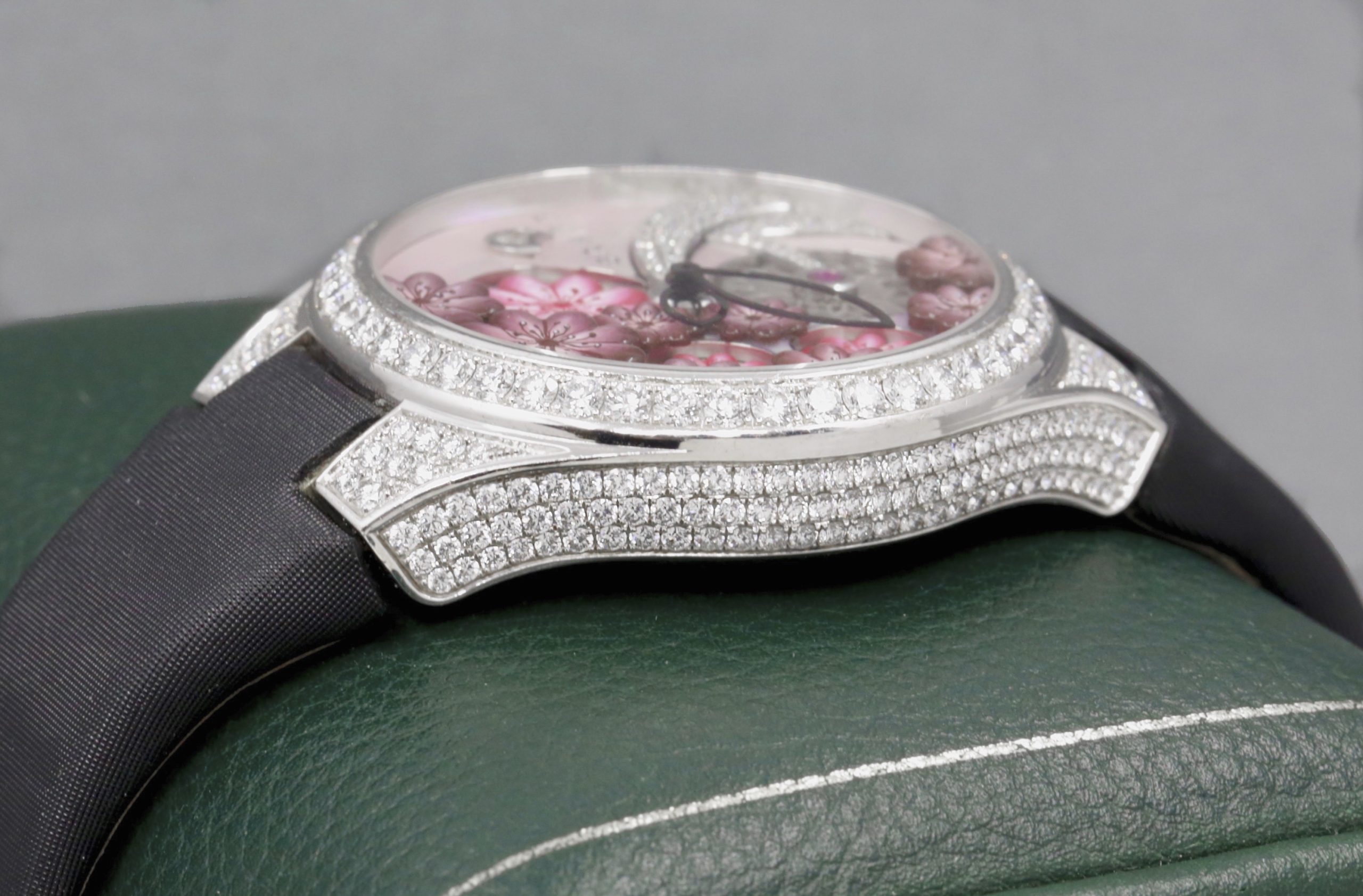 The Graff Floral Automatic Watch in 18ct White Gold, Set with Factory Diamonds on the Case, Lugs, Crown and Bezel, with Mother of Pearl Dial Set with a Floral Design and Diamonds, on a Graff Satin Band with Factory Diamond Set Tang Buckle. Ref: GFA37WGSLD, Box, Book, Additional Graff Satin Strap and Graff Warranty Card. - Image 9